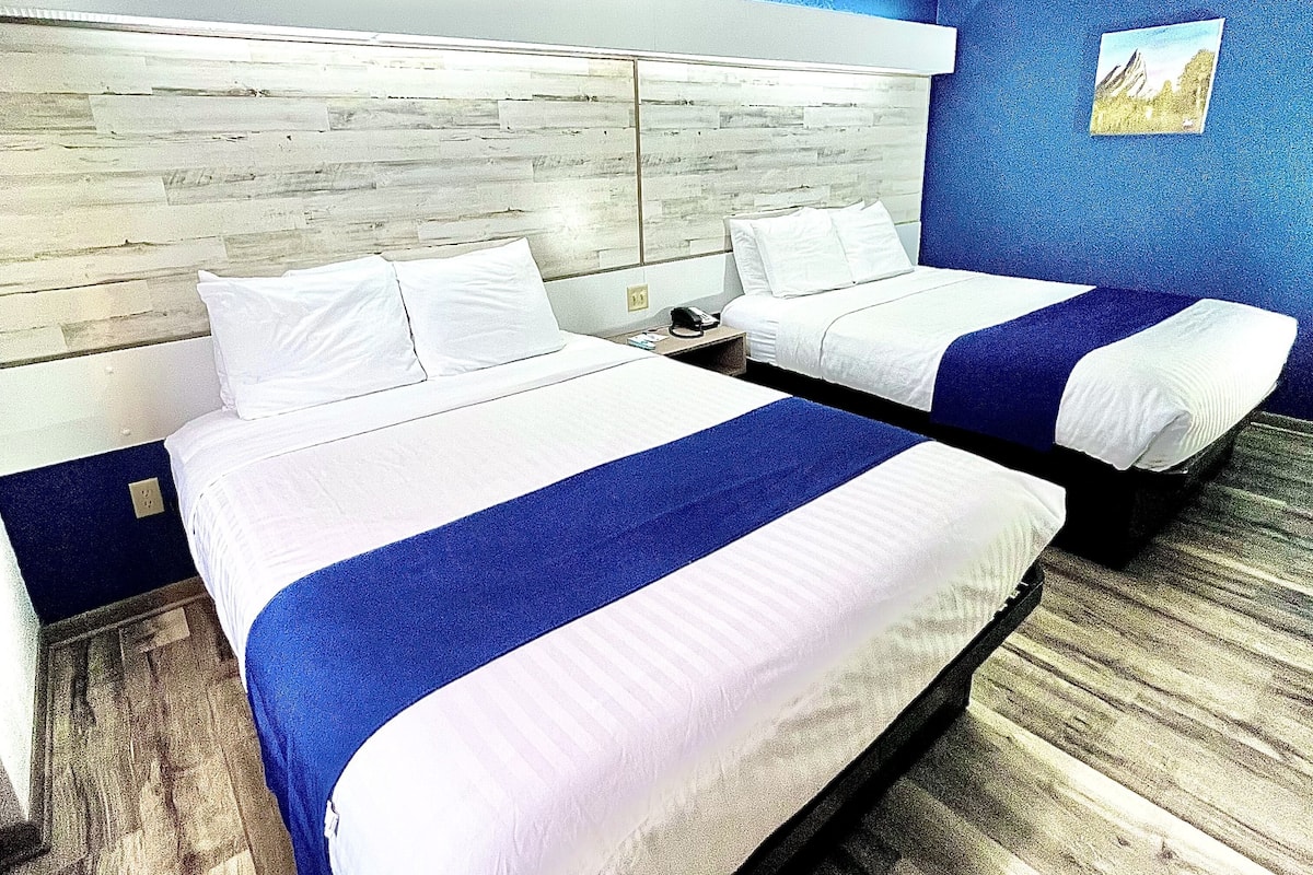 premium bedding, desk, blackout curtains, iron/ironing board