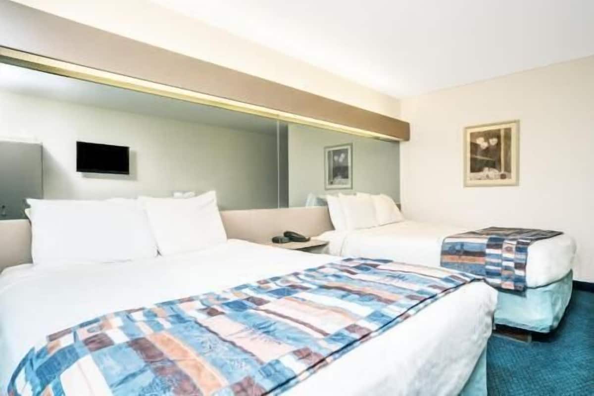 Premium bedding, desk, blackout curtains, iron/ironing board