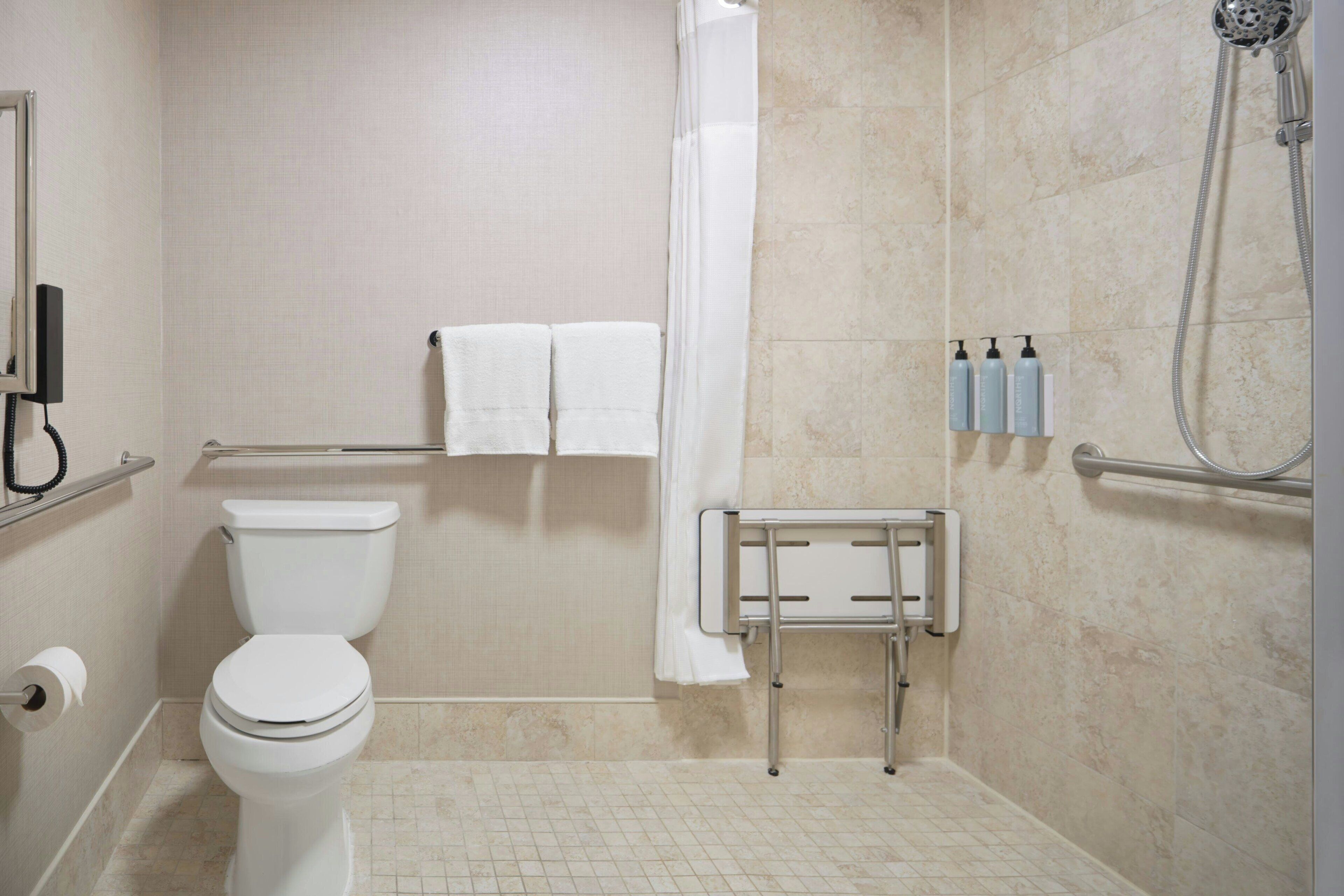 combined shower/bathtub, free toiletries, hair dryer, towels