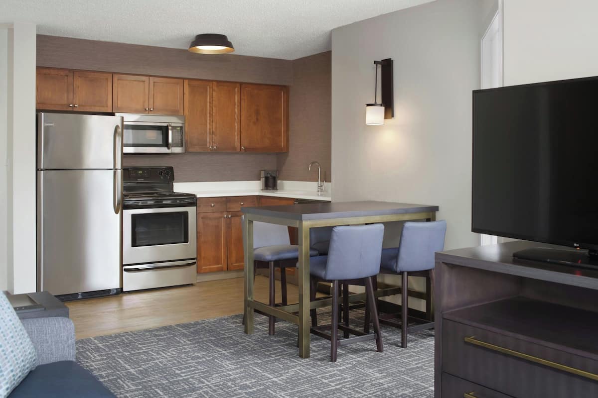 hypo-allergenic bedding, desk, blackout curtains, iron/ironing board