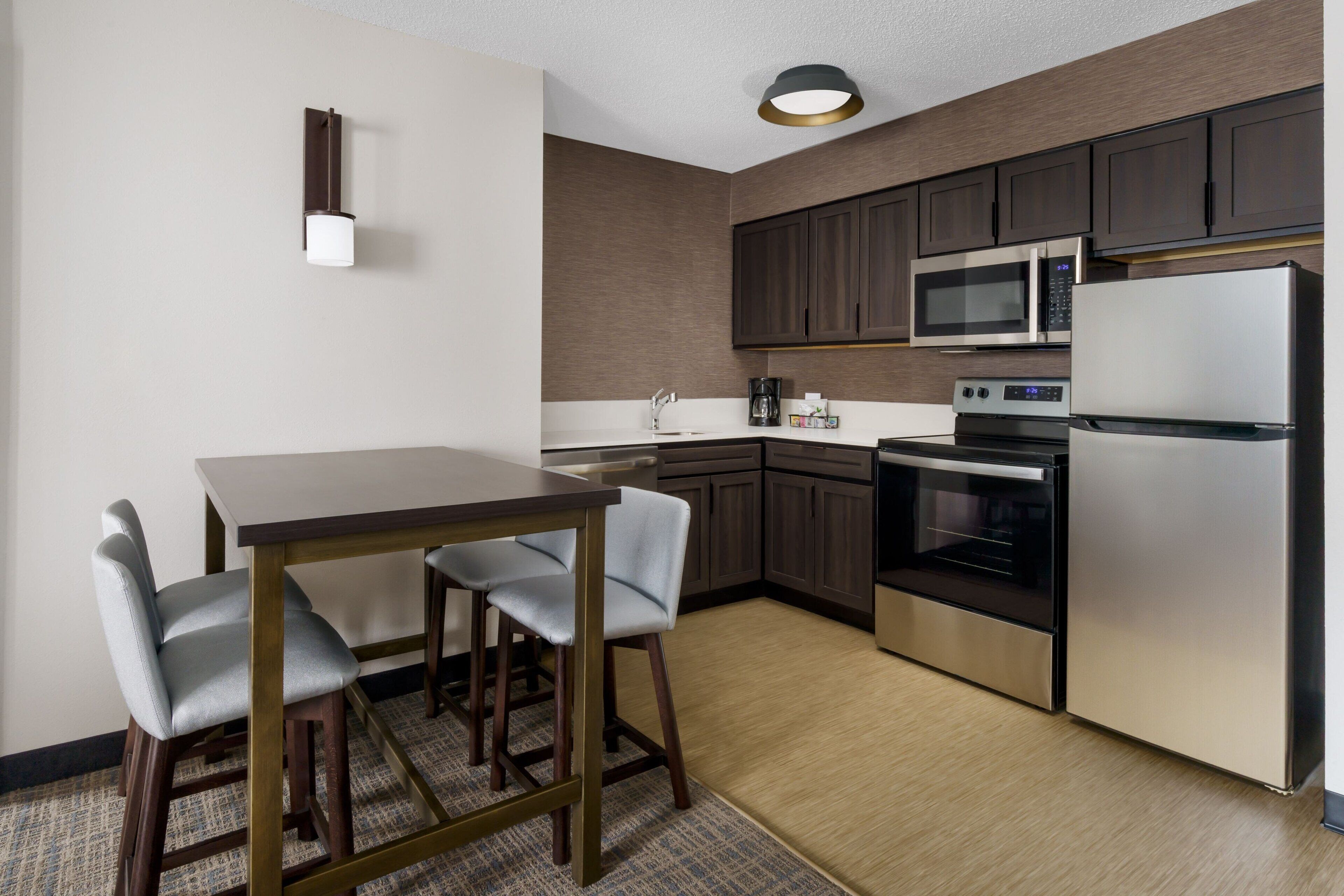 suite, 2 bedrooms | private kitchen | full-sized fridge, microwave, stovetop, dishwasher