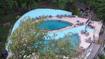 Seasonal outdoor pool, open 10:00 AM to 10:00 PM, sun loungers