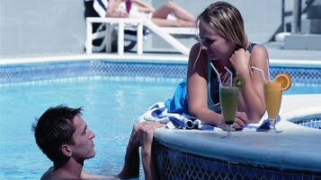 Outdoor pool, pool umbrellas, pool loungers