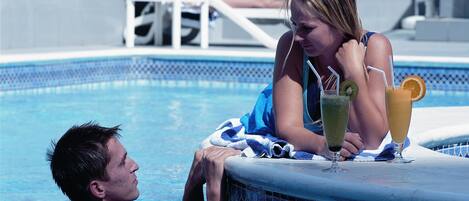 Outdoor pool, pool umbrellas, pool loungers