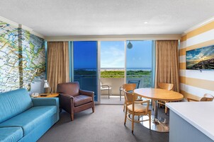 Ocean Front Efficiency | Living area | Flat-screen TV, DVD player