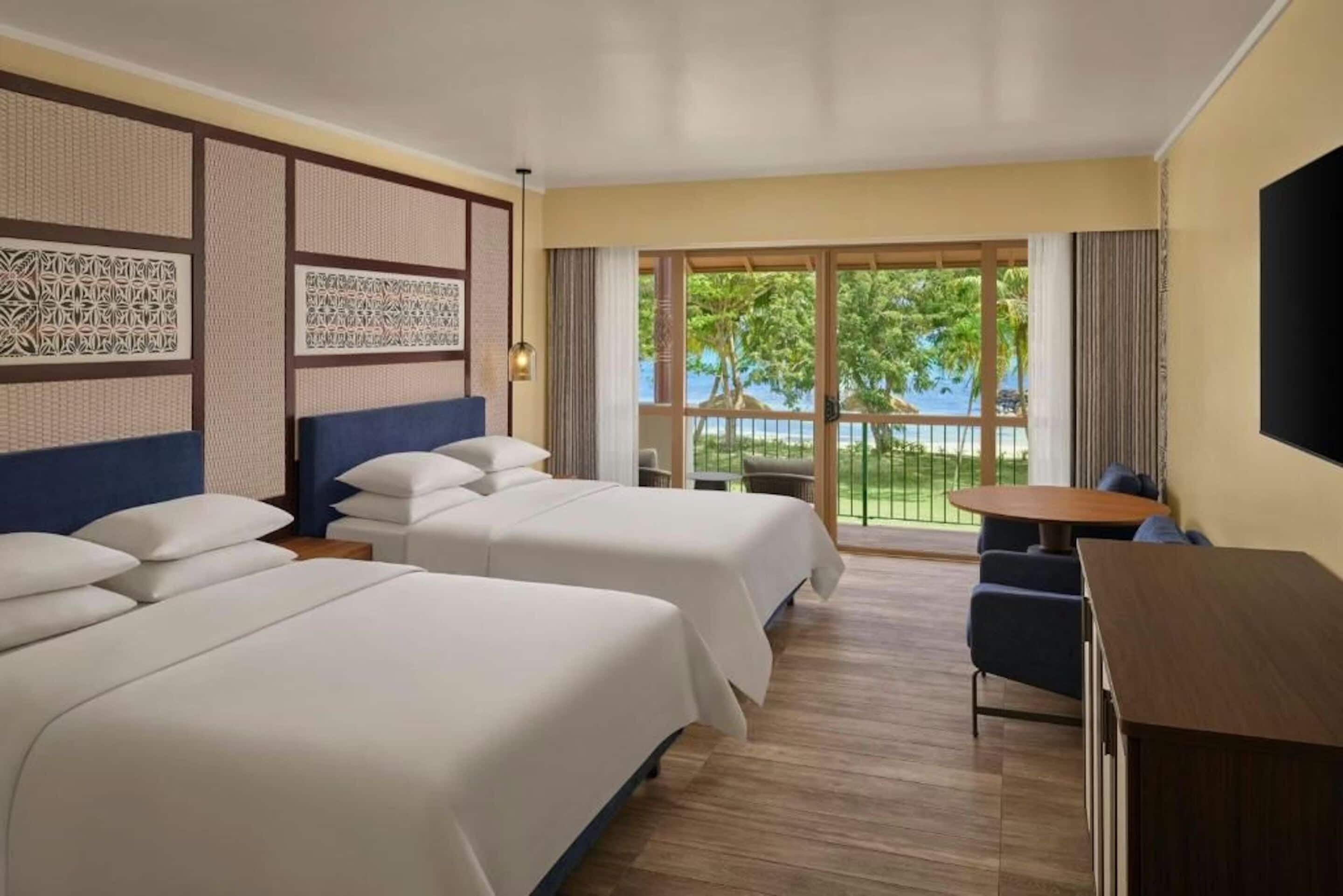 Deluxe Room, 2 Queen Beds, Ocean View | Hypo-allergenic bedding, in-room safe, desk, blackout drapes
