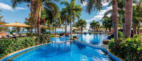 Outdoor pool, open 7:00 AM to 9:00 PM, pool umbrellas, pool loungers