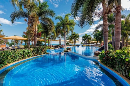 Outdoor pool, open 7:00 AM to 9:00 PM, pool umbrellas, sun loungers. Samoa Beach Resort