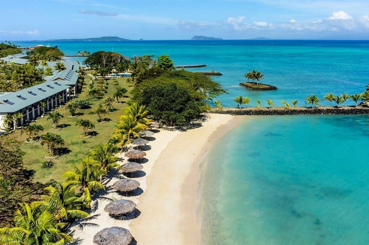 Private beach, white sand, sun loungers, beach umbrellas