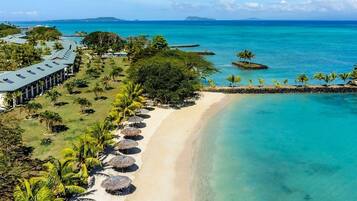 Private beach, white sand, sun loungers, beach umbrellas