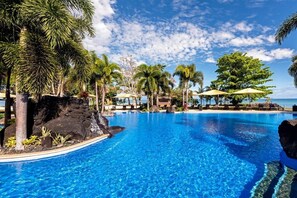 Outdoor pool, open 7:00 AM to 9:00 PM, pool umbrellas, pool loungers