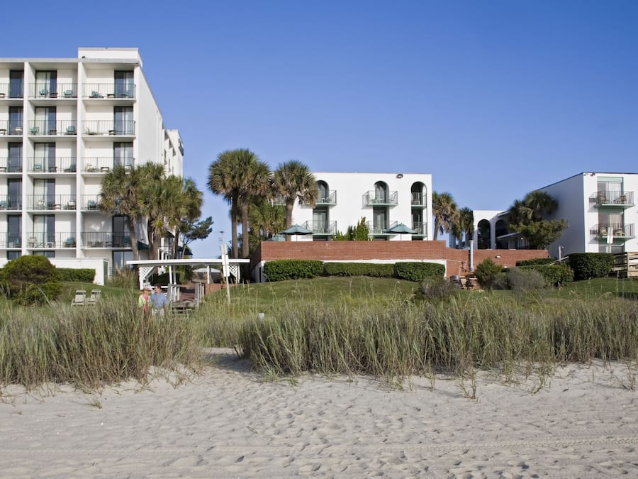 On the beach, sun loungers, beach umbrellas