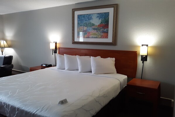 Desk, laptop workspace, blackout curtains, iron/ironing board