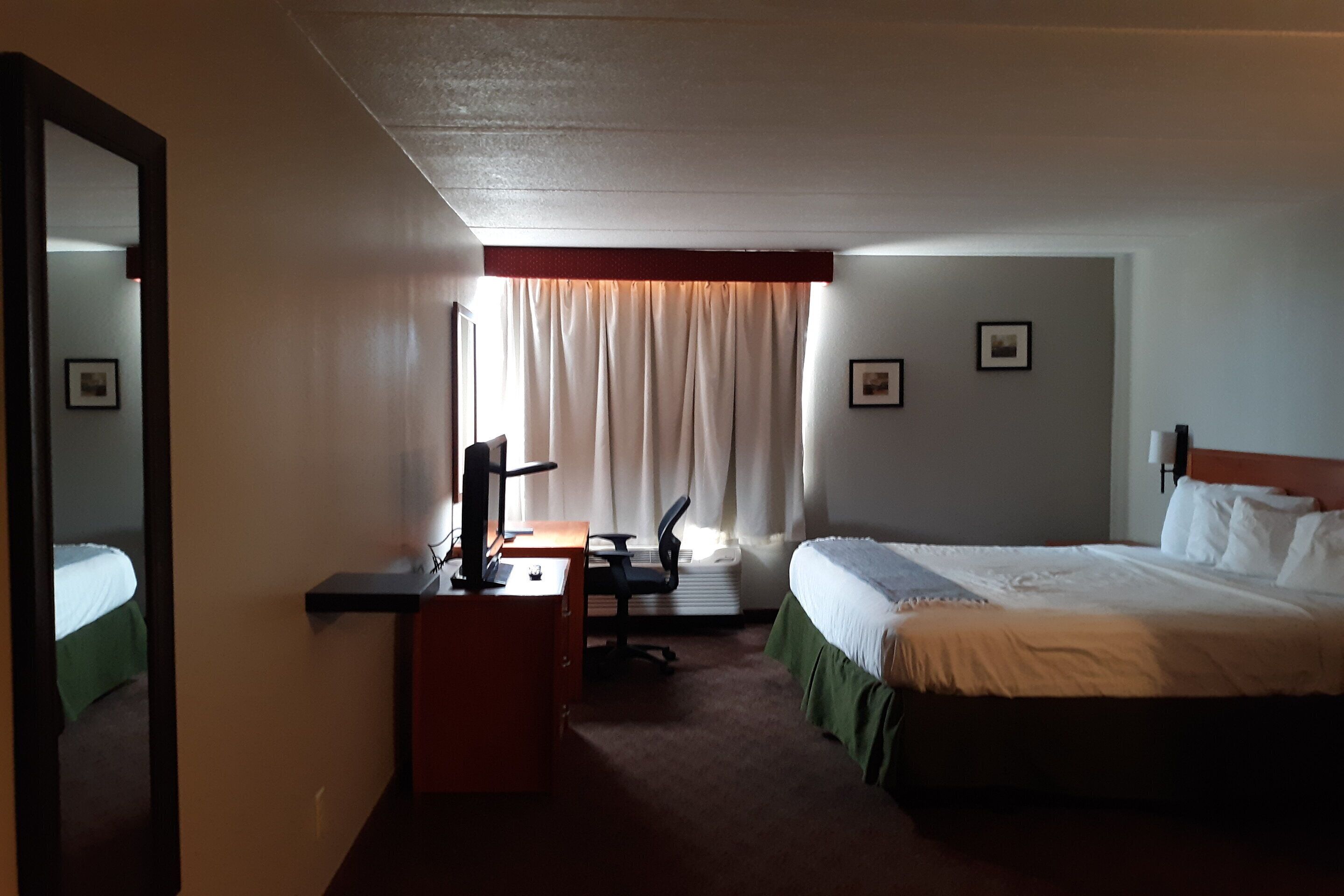 king suite with kitchenette | desk, laptop workspace, blackout curtains, iron/ironing board