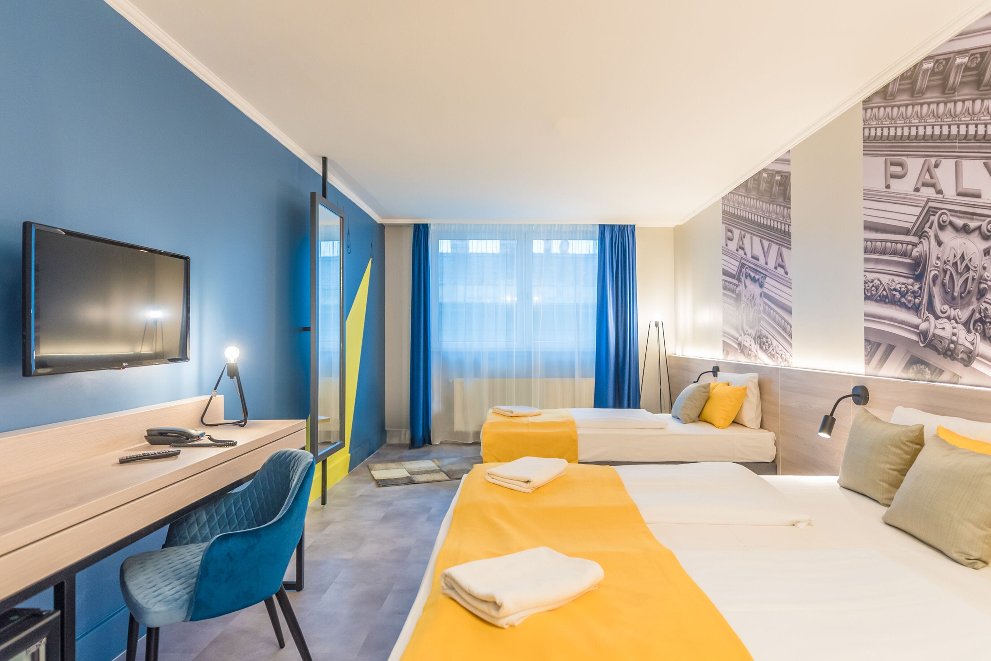 comfort triple room | in-room safe, blackout curtains, iron/ironing board, free wifi