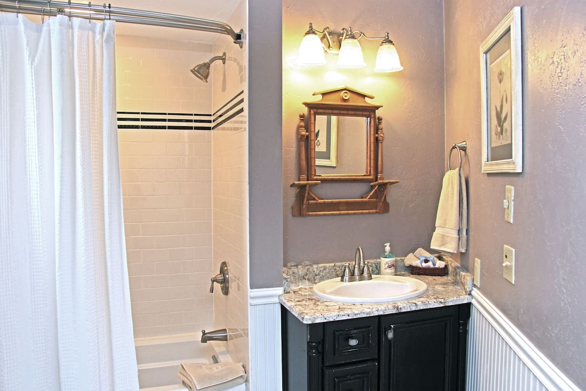 shower, rainfall showerhead, designer toiletries, hair dryer