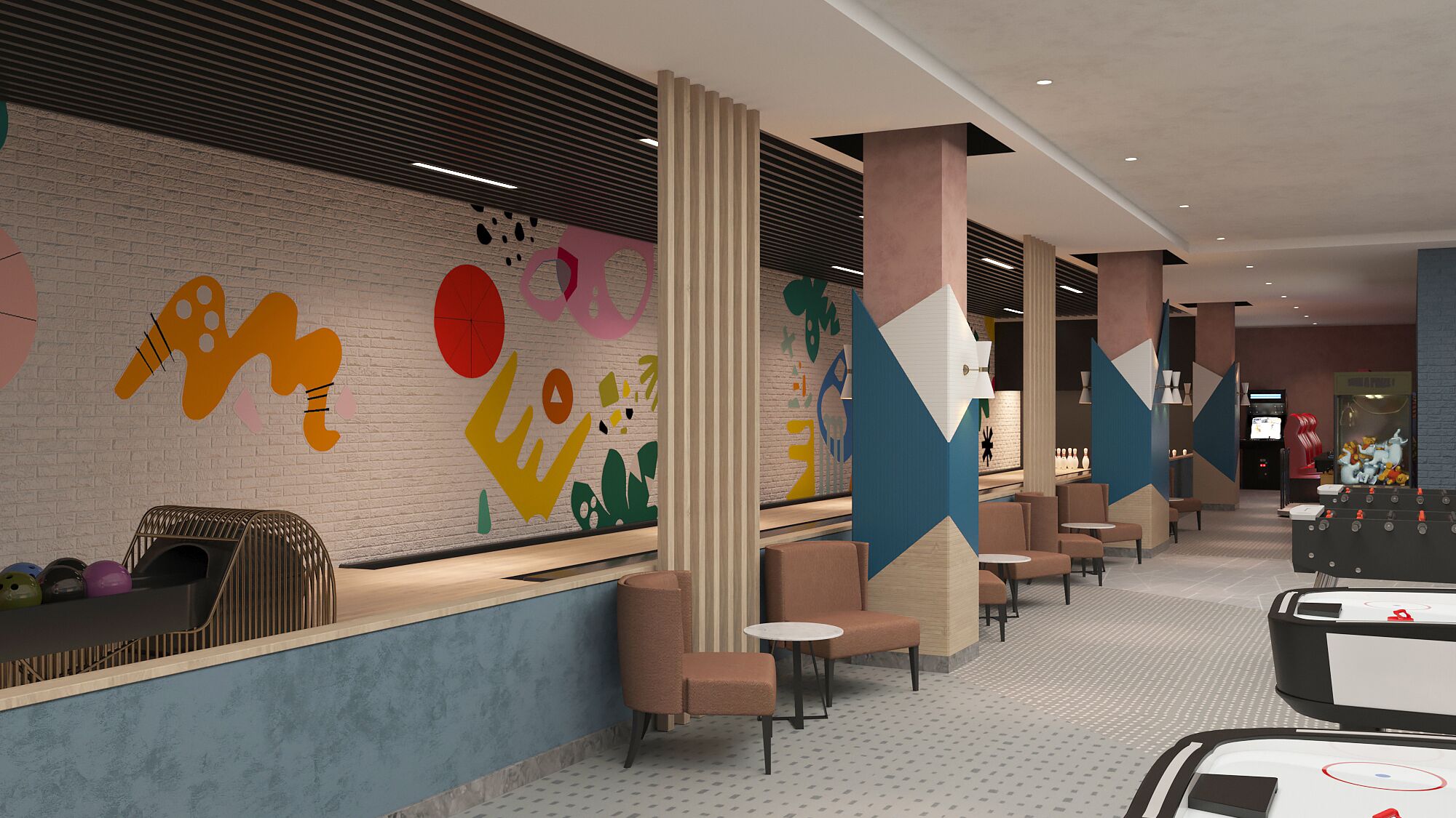 A modern lobby with a colorful abstract mural, seating areas, and a foosball table.