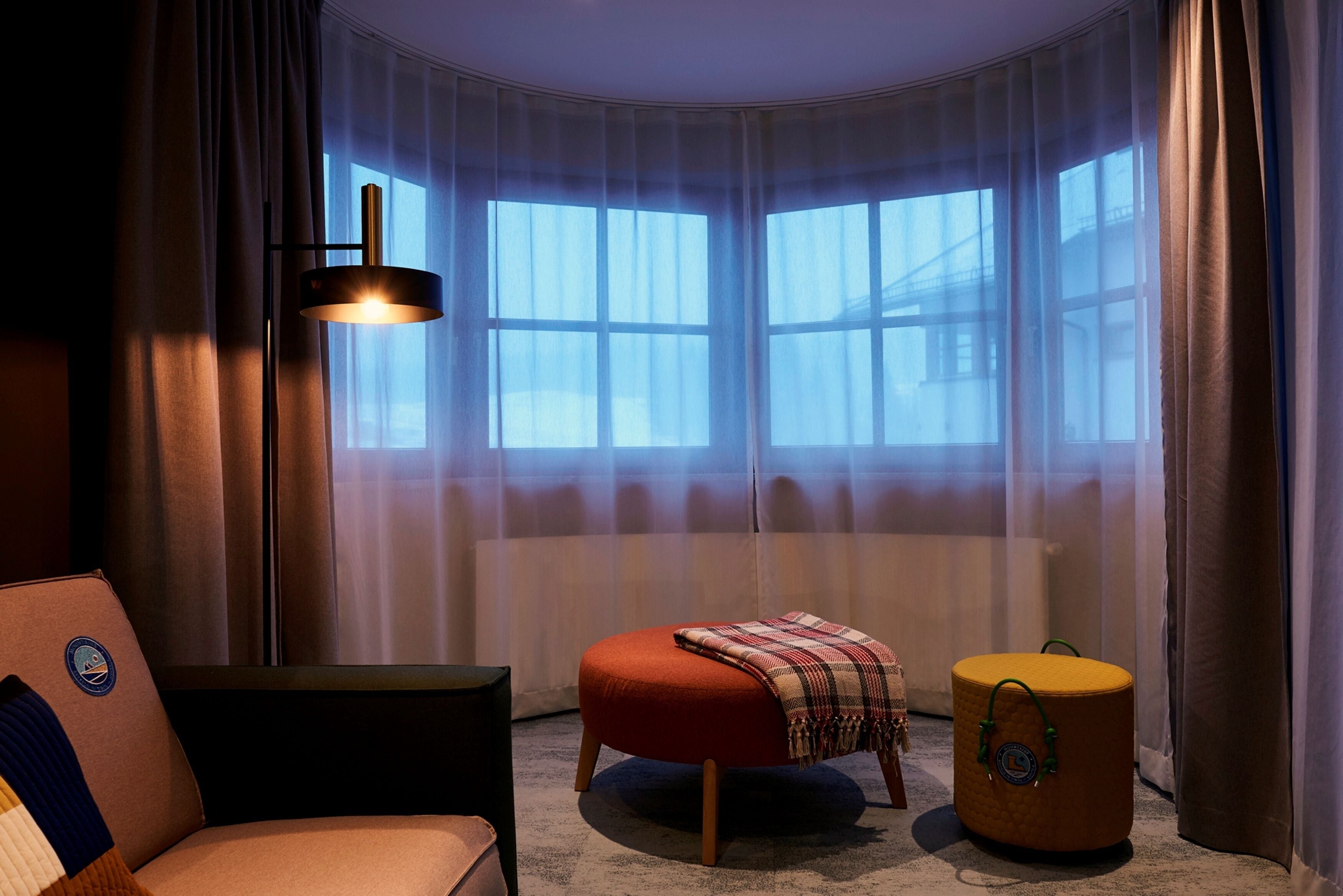 deluxe quadruple room, mountain view | living area | flat-screen tv, ipad