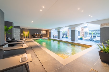 Indoor pool, open 7:00 AM to 10:00 PM, sun loungers. Grand Hotel Normandy by CW Hotel Collection
