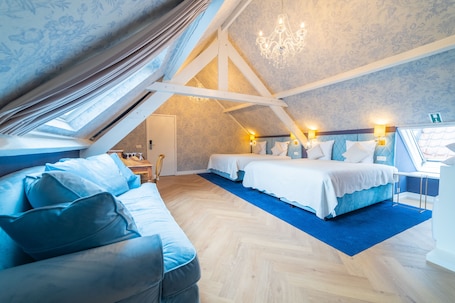 Family Quadruple Room | Minibar, in-room safe, individually decorated, individually furnished. Grand Hotel Normandy by CW Hotel Collection