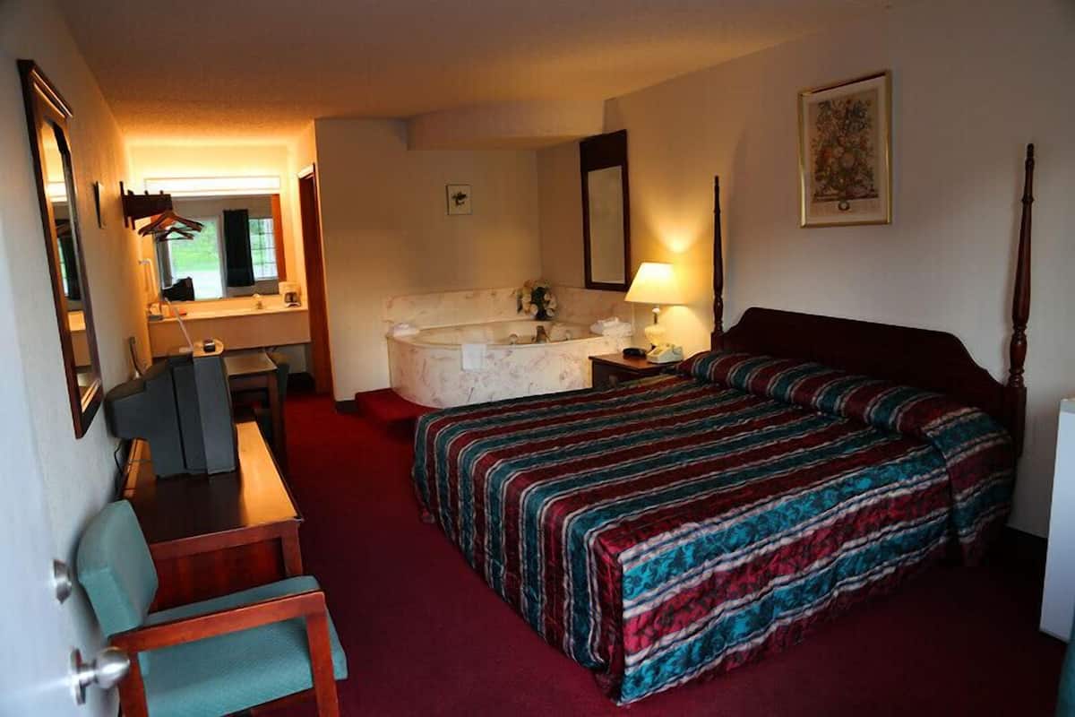 Chambre Standard, 1 trĂšs grand lit, bain Ă remous
