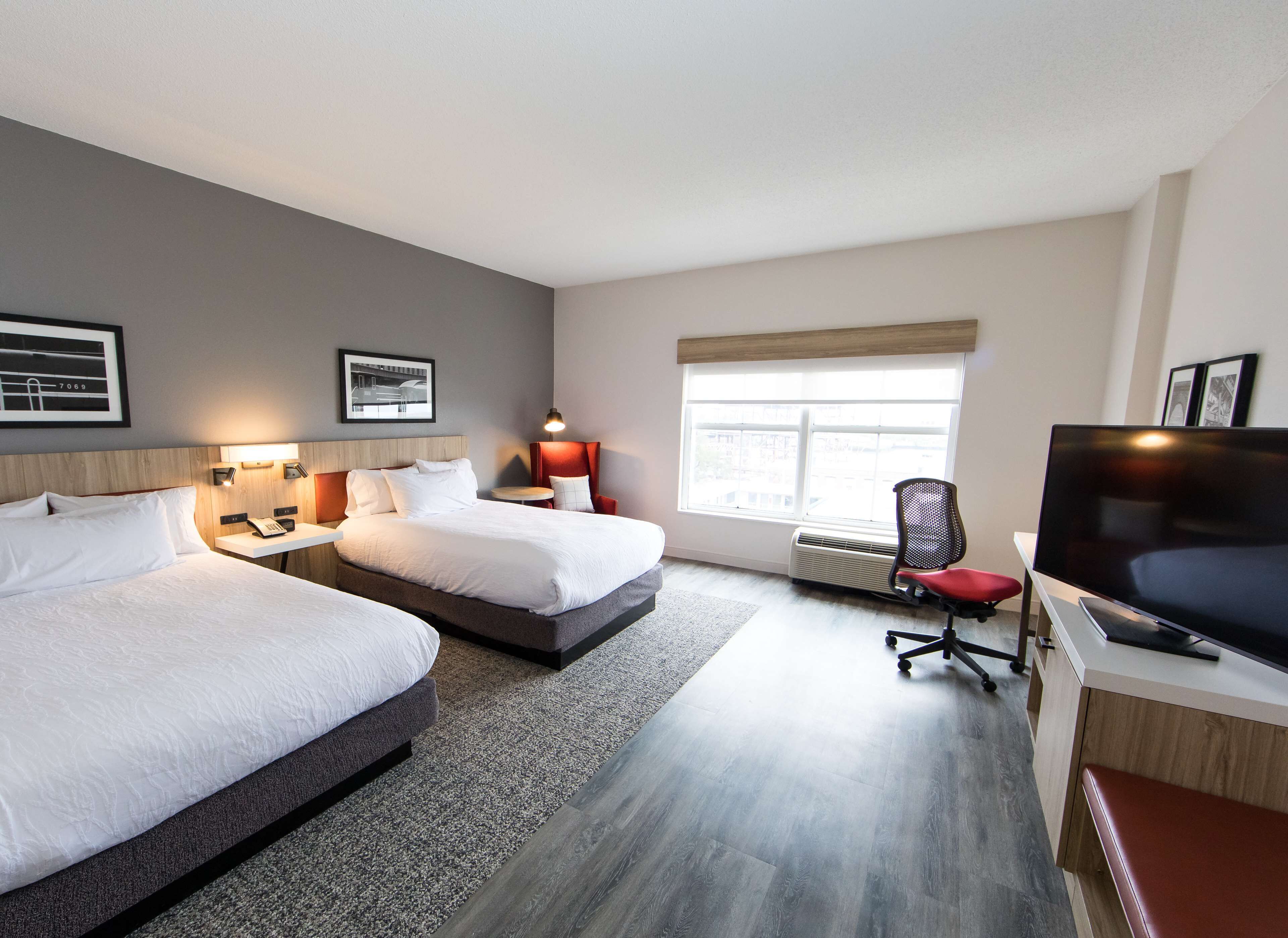 deluxe room, 2 queen beds | hypo-allergenic bedding, down duvets, in-room safe, iron/ironing board