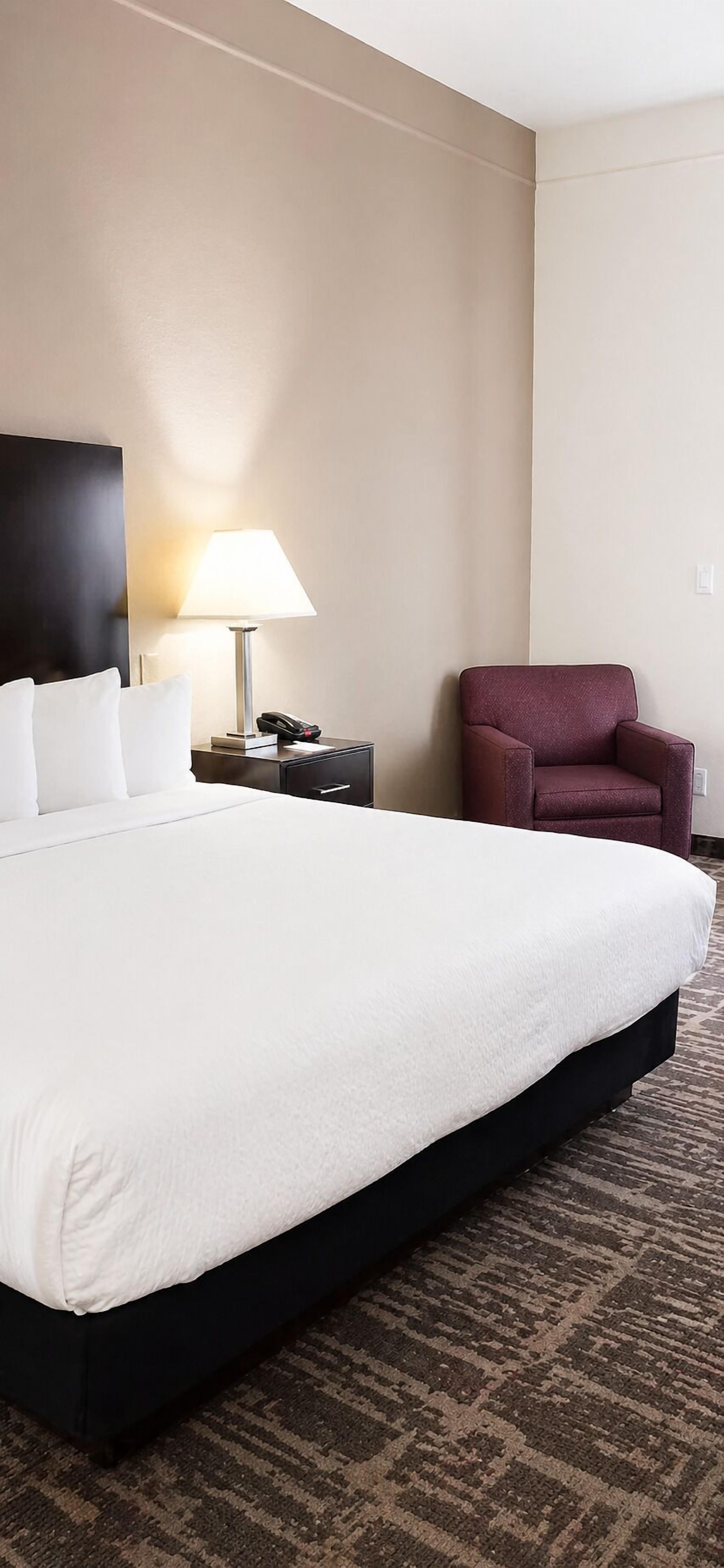 Premium bedding, desk, iron/ironing board, free cribs/infant beds