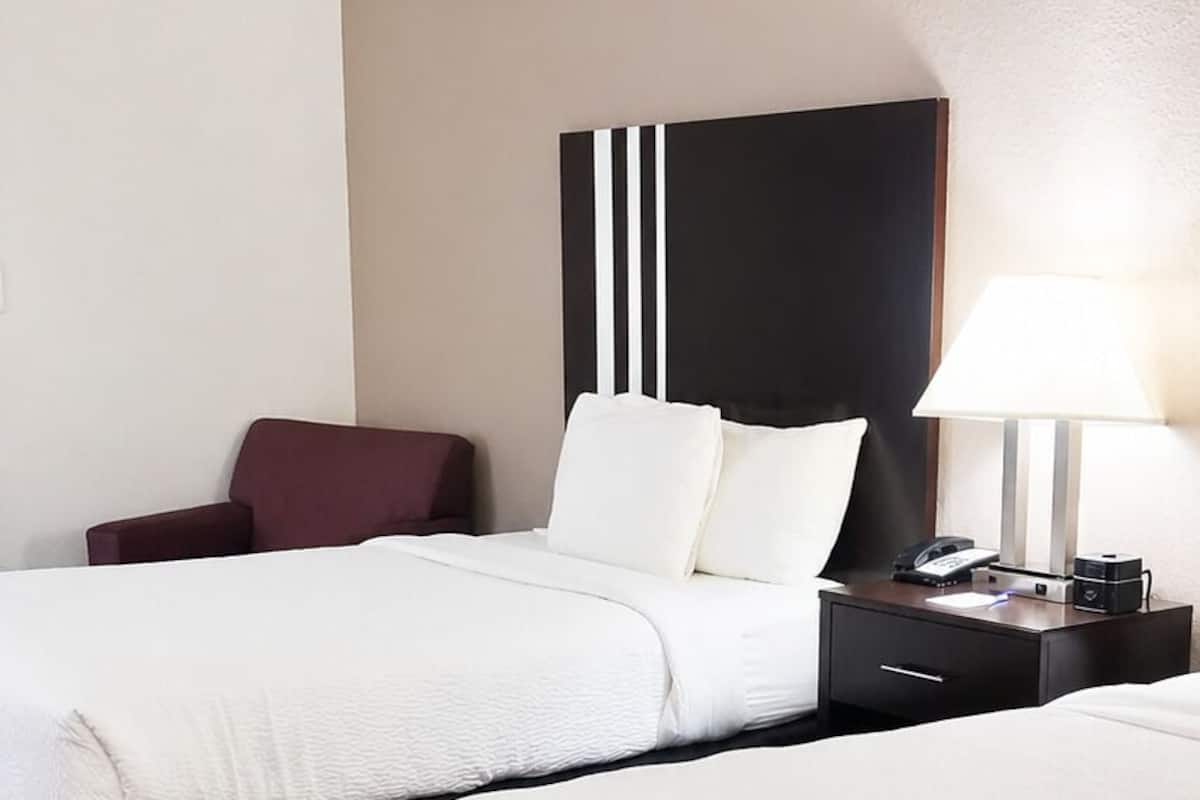 Room, 2 Double Beds, Non Smoking | Premium bedding, desk, iron/ironing board, free cots/infant beds