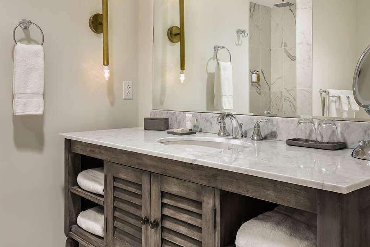 designer toiletries, hair dryer, bathrobes, towels