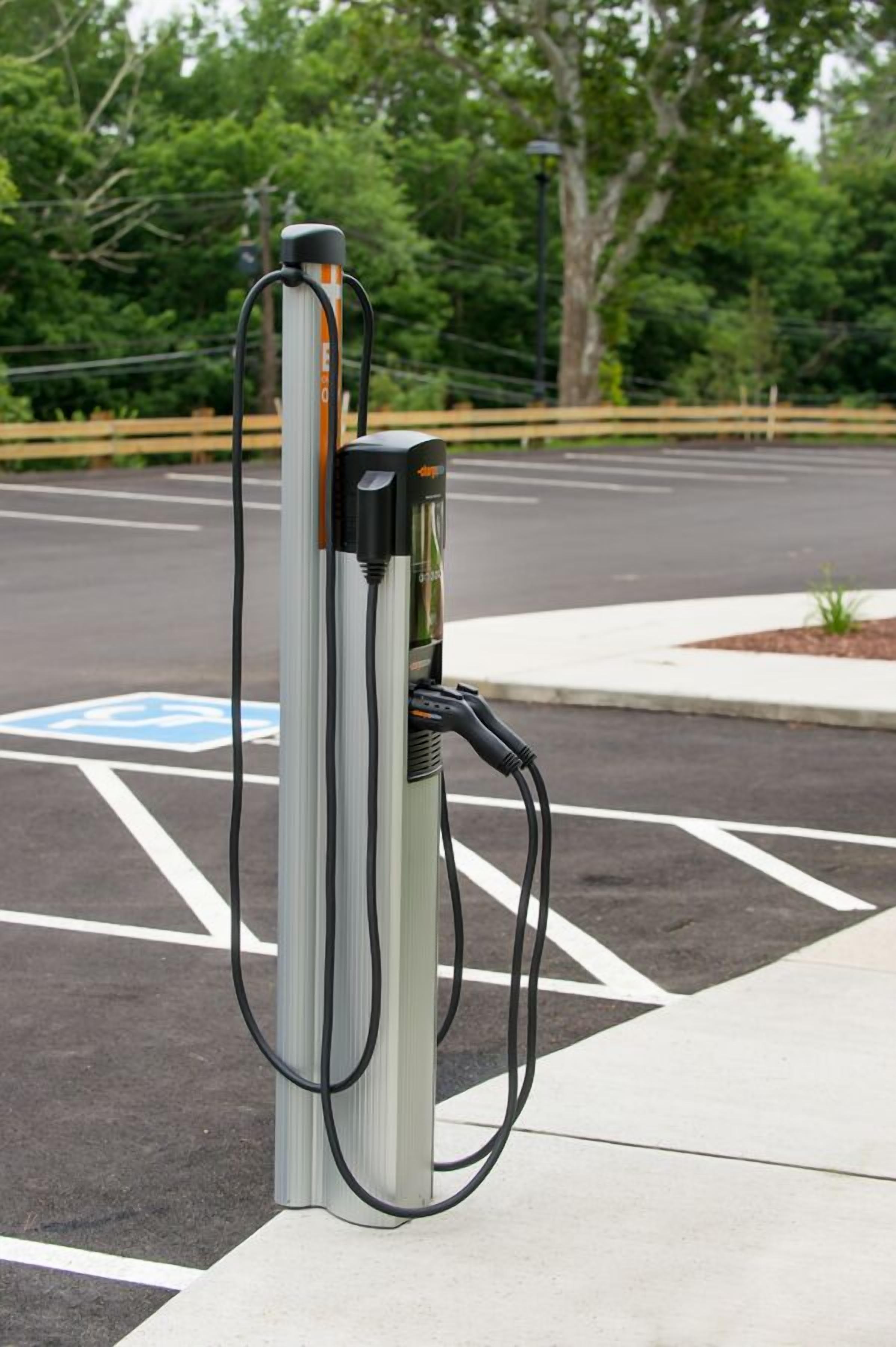 A parking space with a charging station.