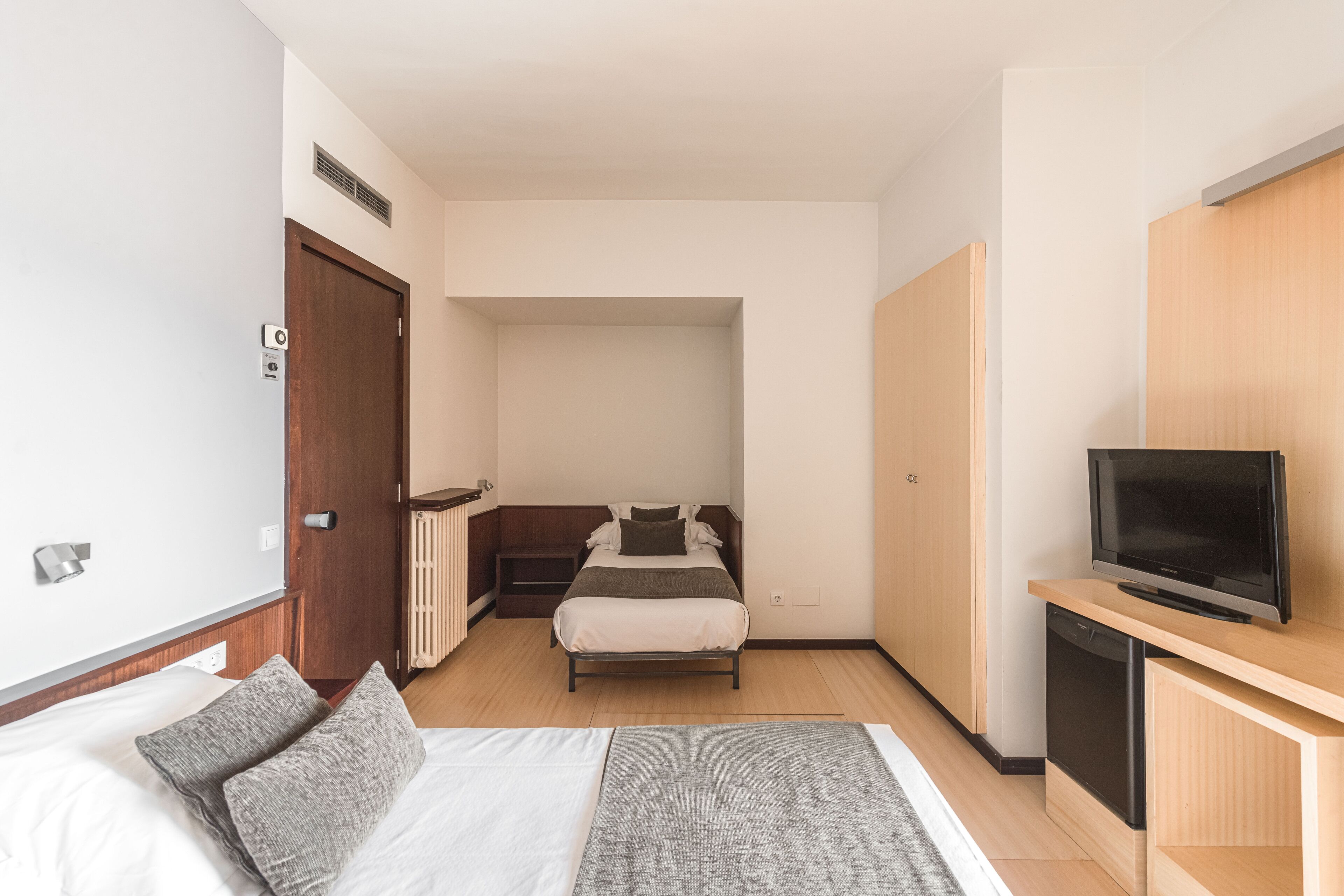 triple room | 1 bedroom, down duvets, minibar, in-room safe