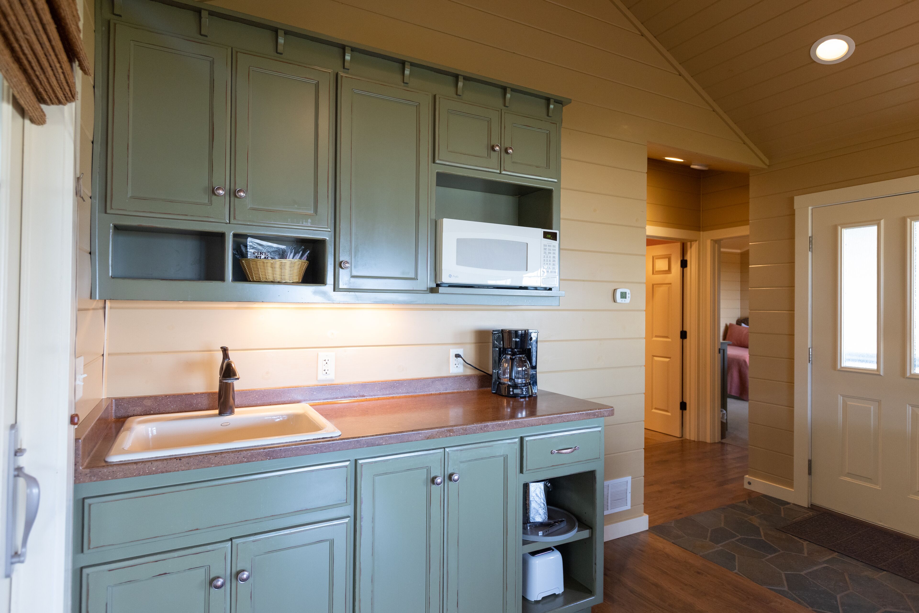 premier lakeview two bedroom cottage | private kitchenette | fridge, microwave, coffee/tea maker, dining tables