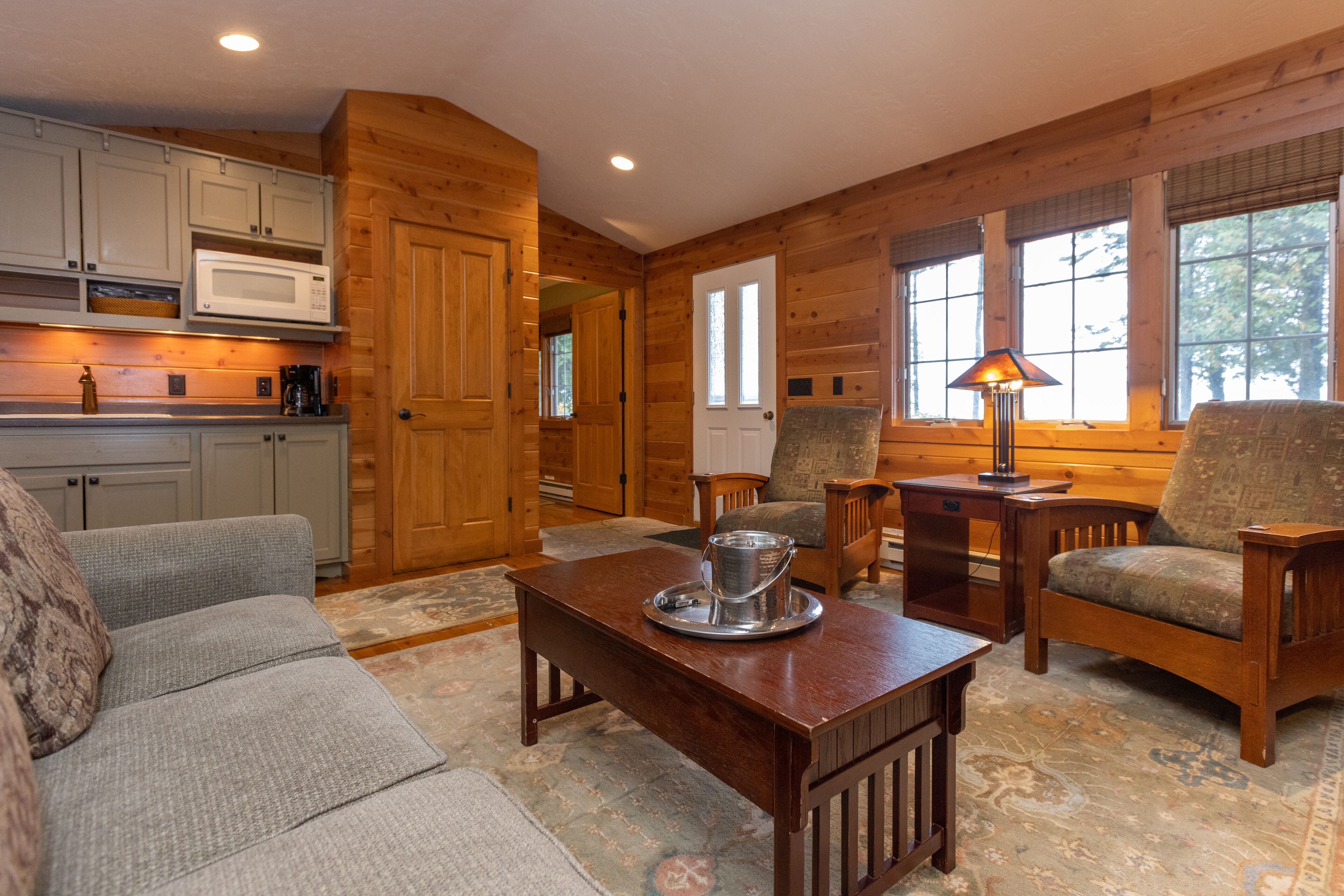 premier lakeview one bedroom cottage | living room | flat-screen tv