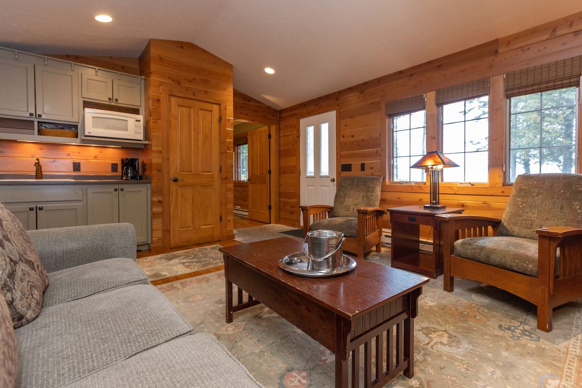 premier lakeview one bedroom cottage | living room | flat-screen tv