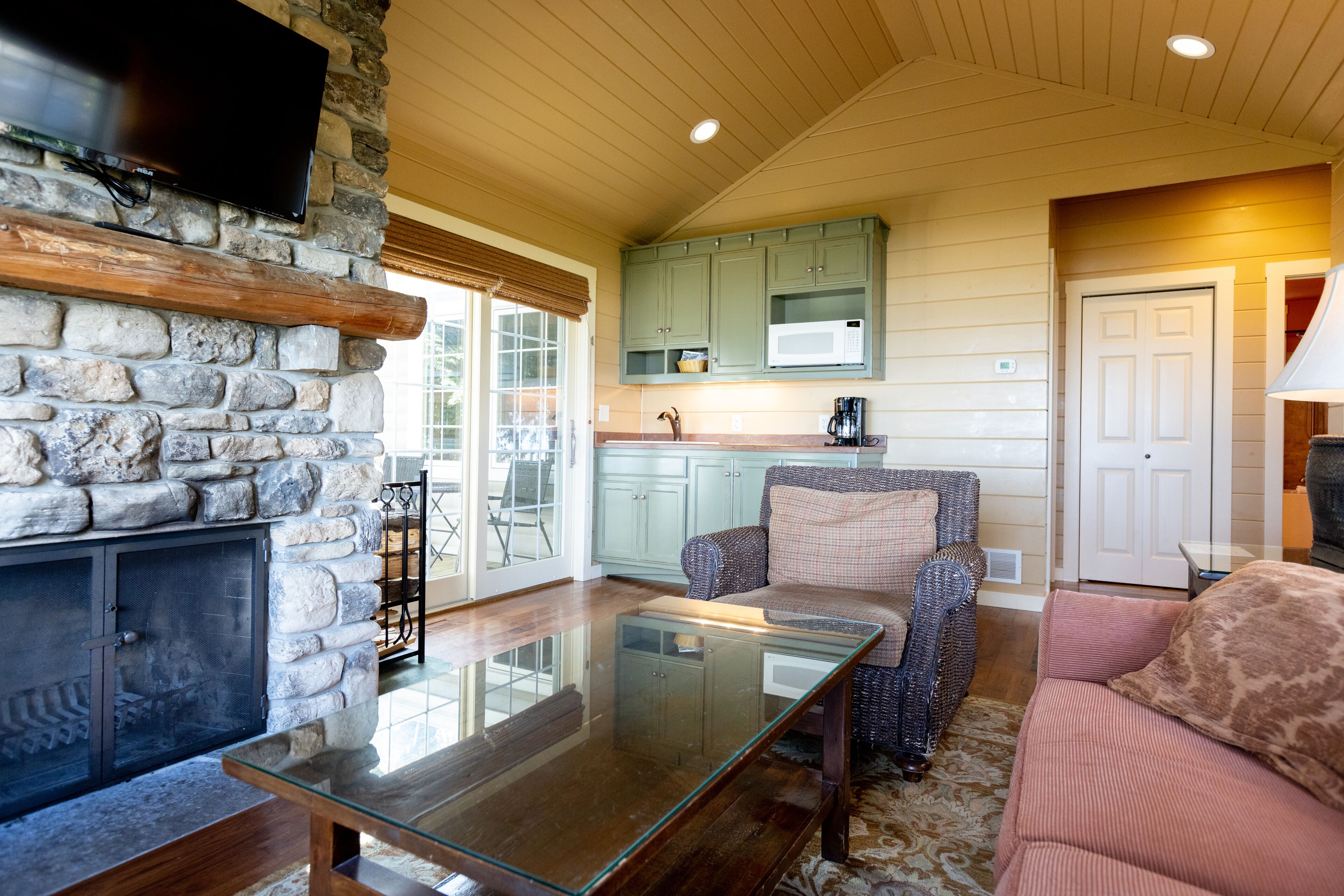 premier lakeview two bedroom cottage | living room | flat-screen tv