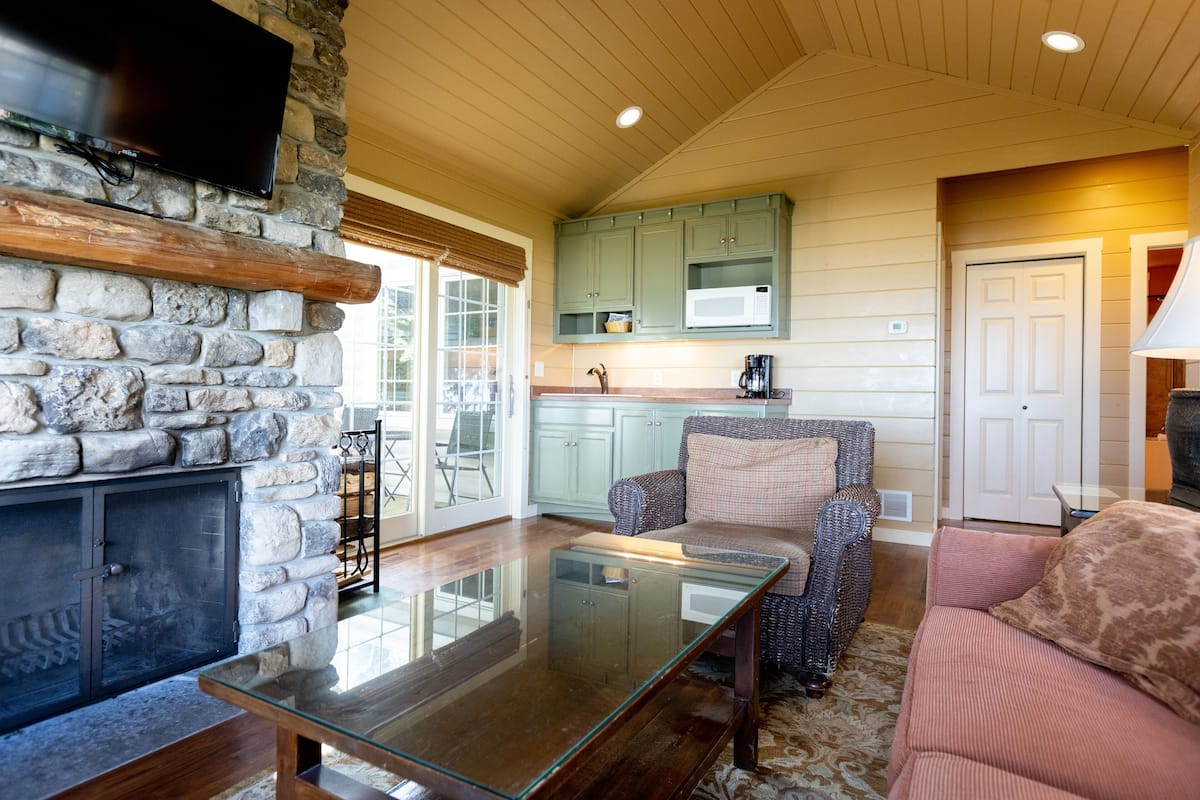 premier lakeview two bedroom cottage | living room | flat-screen tv