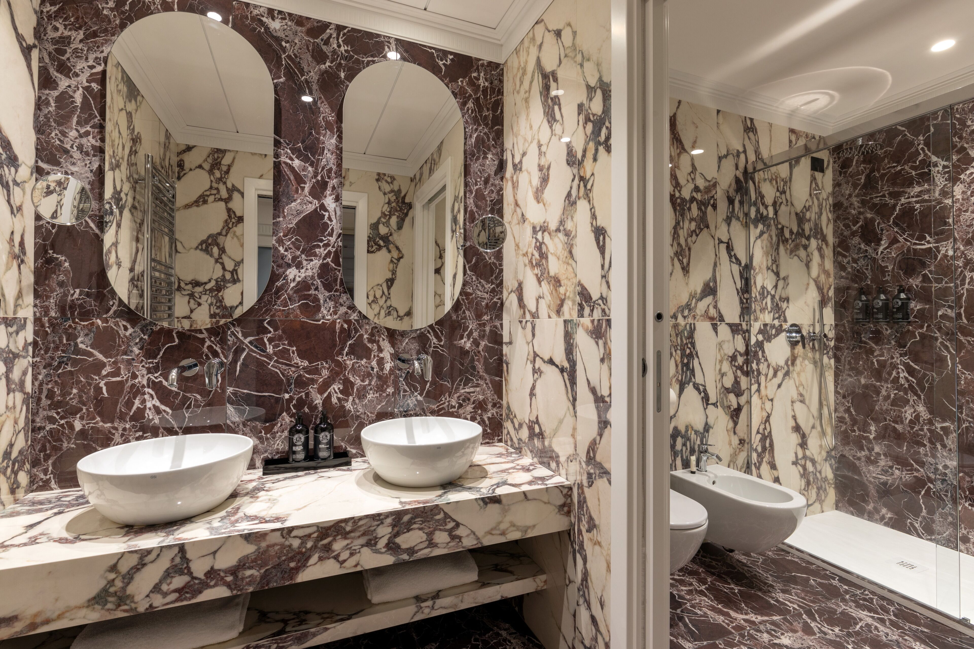 suite | bathroom | shower, rainfall showerhead, eco-friendly toiletries, hair dryer