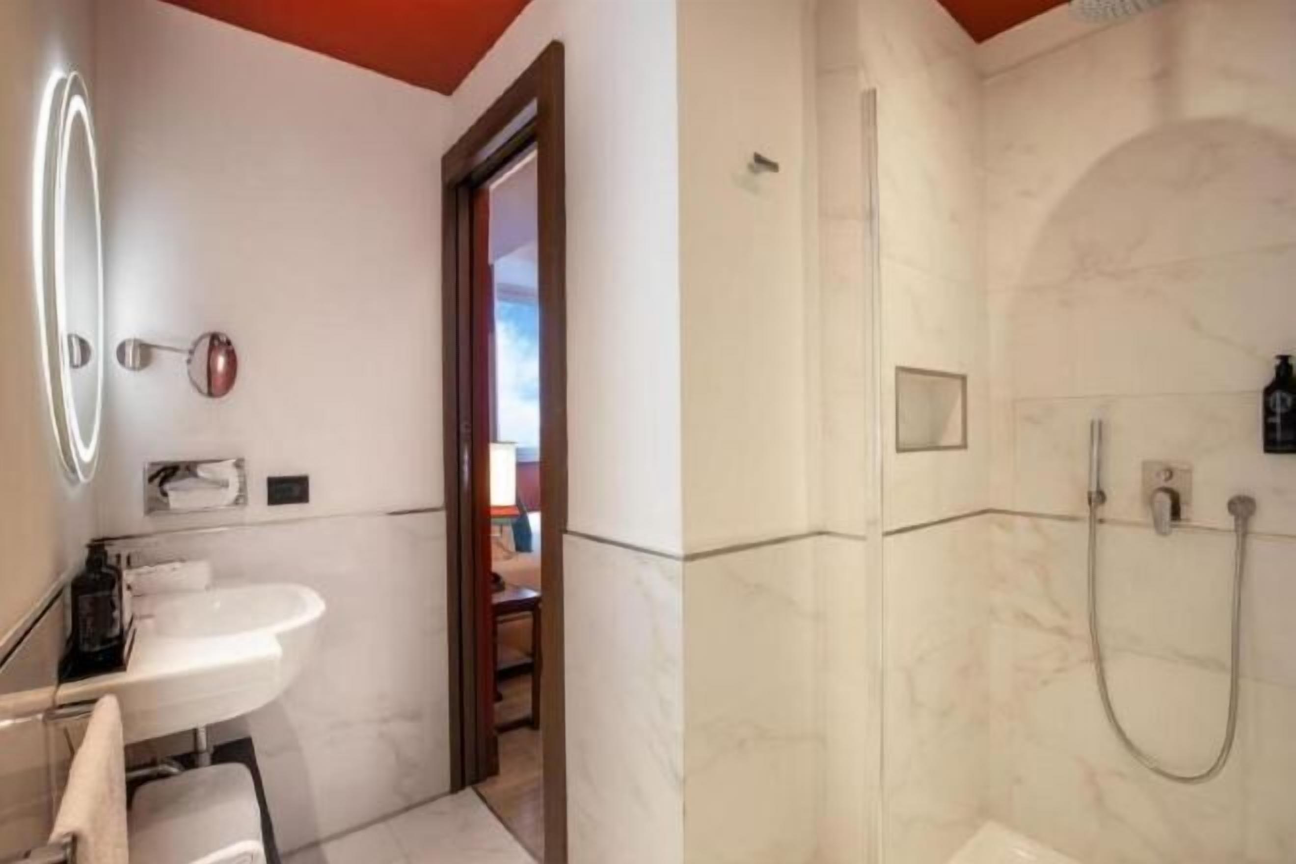 Bathroom | Shower, rainfall showerhead, eco-friendly toiletries, hair dryer