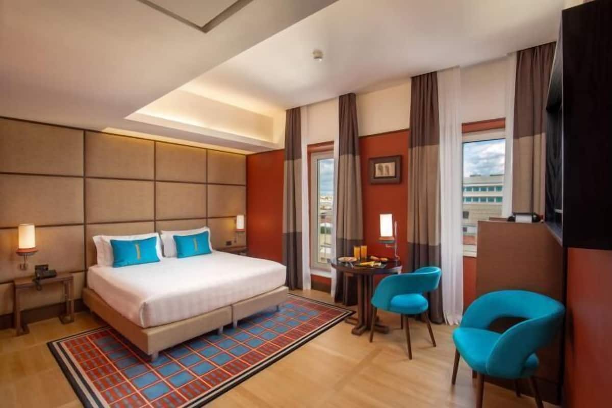 Premium bedding, down duvets, minibar, in-room safe