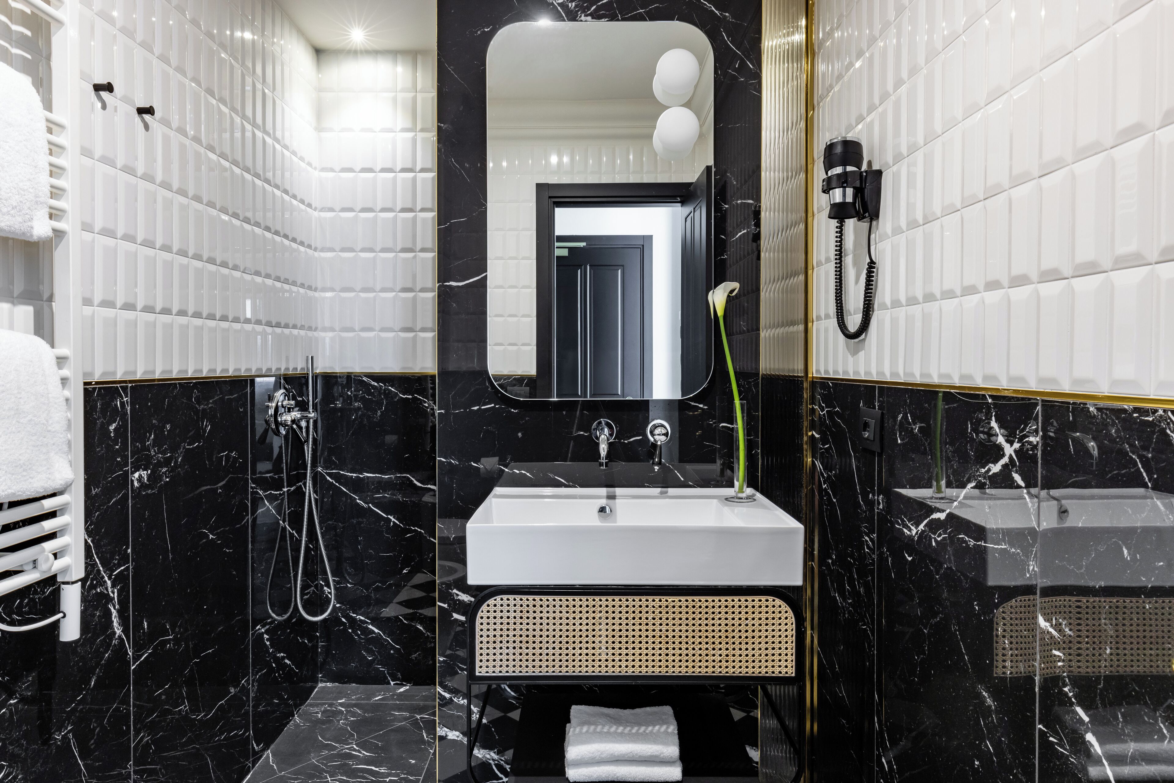 hair dryer, slippers, bidet, towels