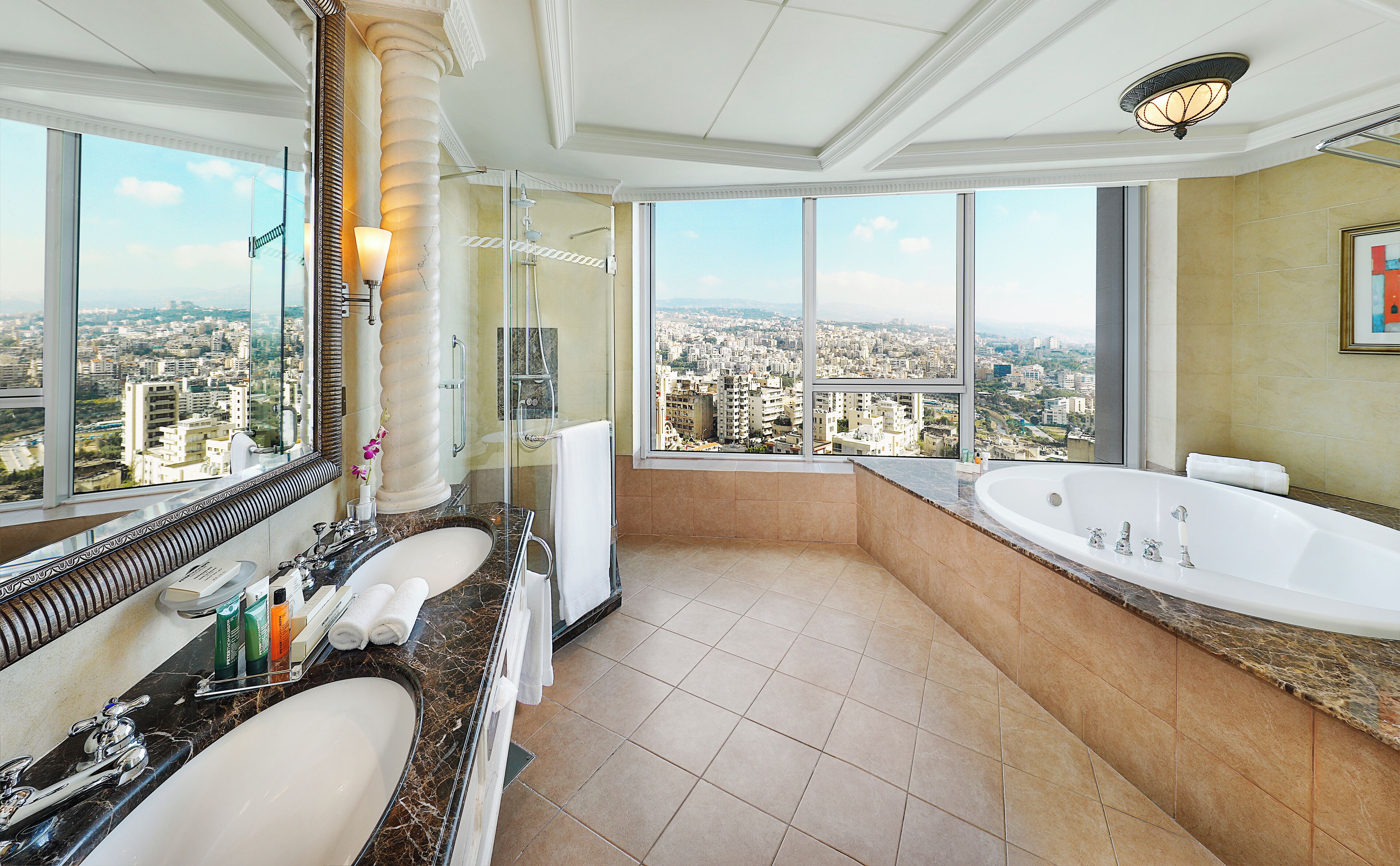 ambassador suite | bathroom | separate bathtub and shower, rainfall showerhead, free toiletries