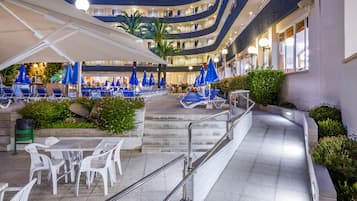 Indoor pool, pool umbrellas, pool loungers