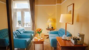 Suite, Balcony, Sea View | Living area | 55-inch LCD TV with satellite channels, TV