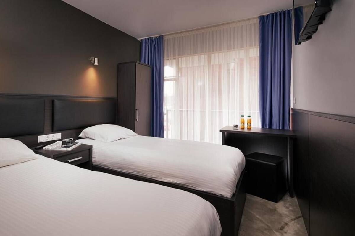 Una cassaforte in camera, una scrivania, Wi-Fi gratuito, lenzuola