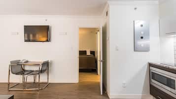 42-inch flat-screen TV with satellite channels, TV