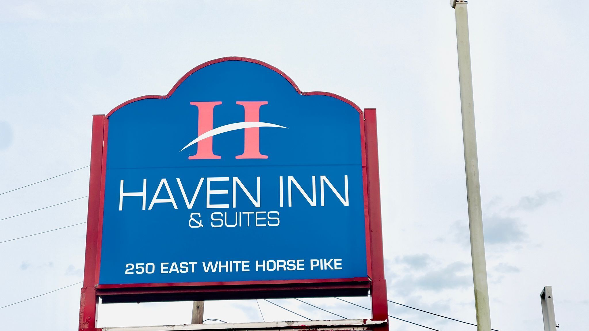 A sign for Haven Inn & Suites at 250 East White Horse Pike.