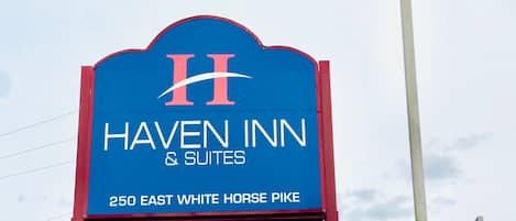 A sign for Haven Inn & Suites at 250 East White Horse Pike.