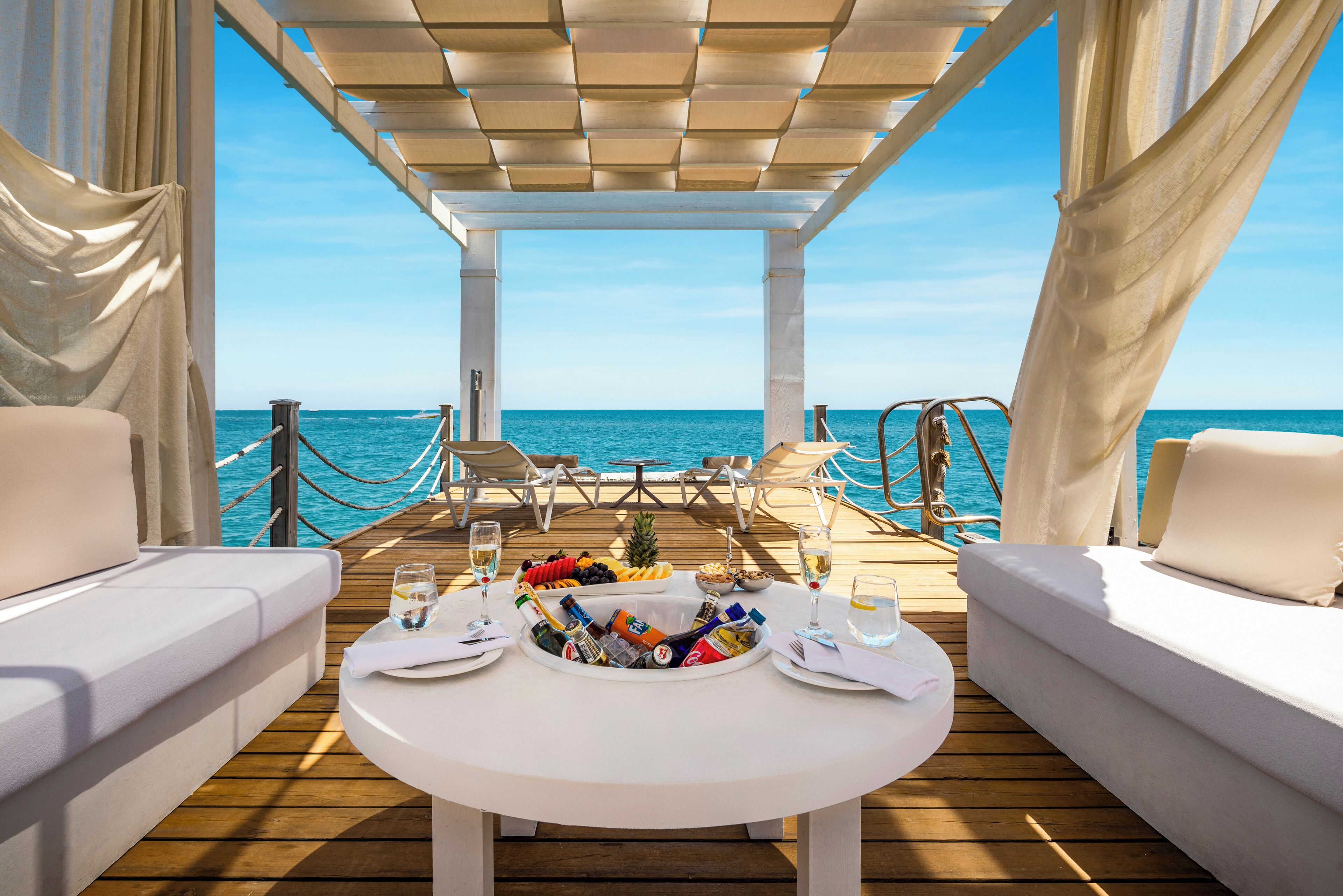 Private beach, free beach shuttle, beach cabanas, sun loungers