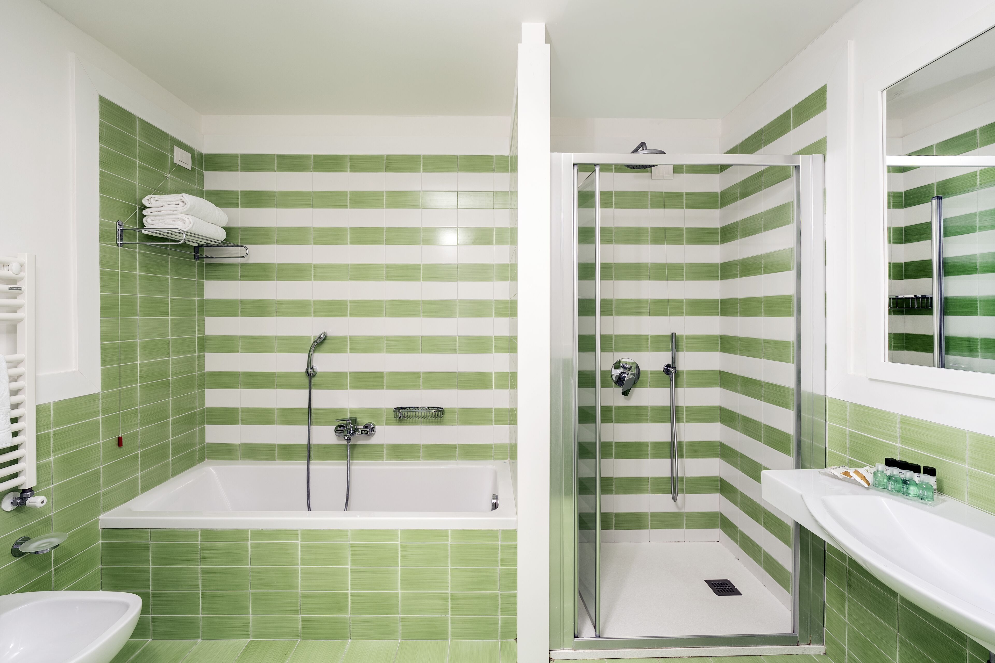 junior suite, balcony, sea view | bathroom | combined shower/bathtub, free toiletries, hair dryer, bidet