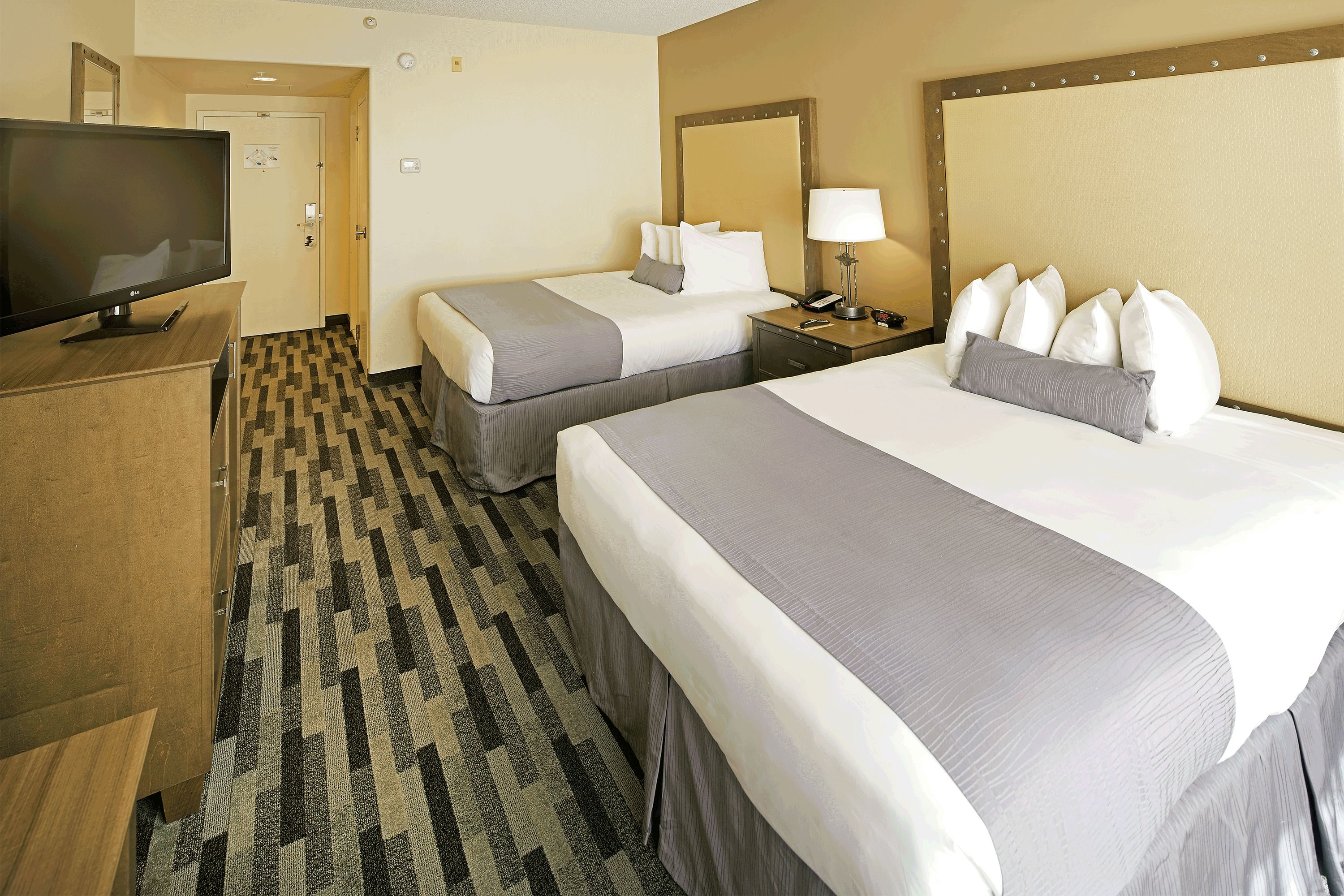 standard room, 2 queen beds | premium bedding, desk, blackout curtains, iron/ironing board